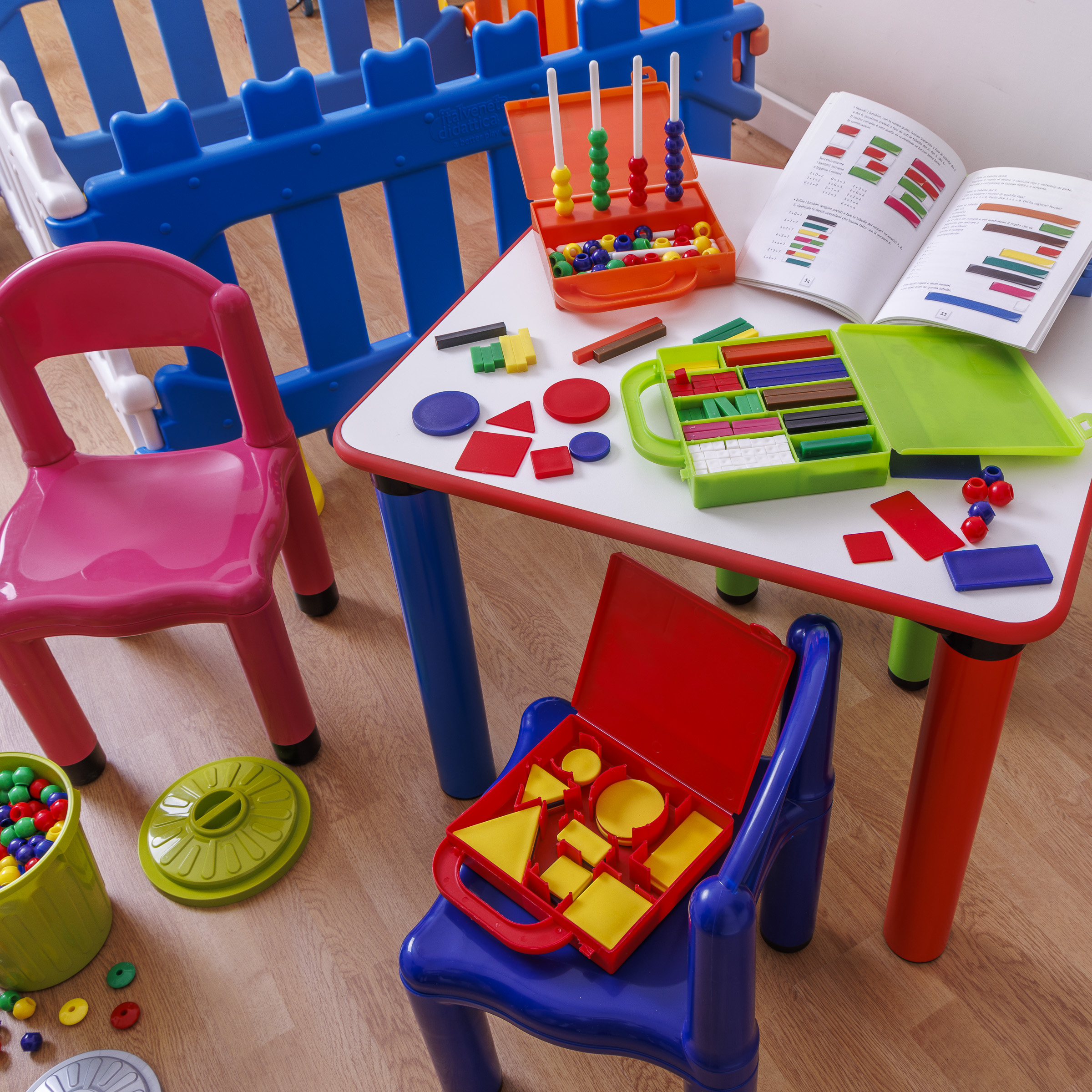 Teaching kit with cuisenaire rods, multibase abacus, logical figures, and educational manual. - Image 7
