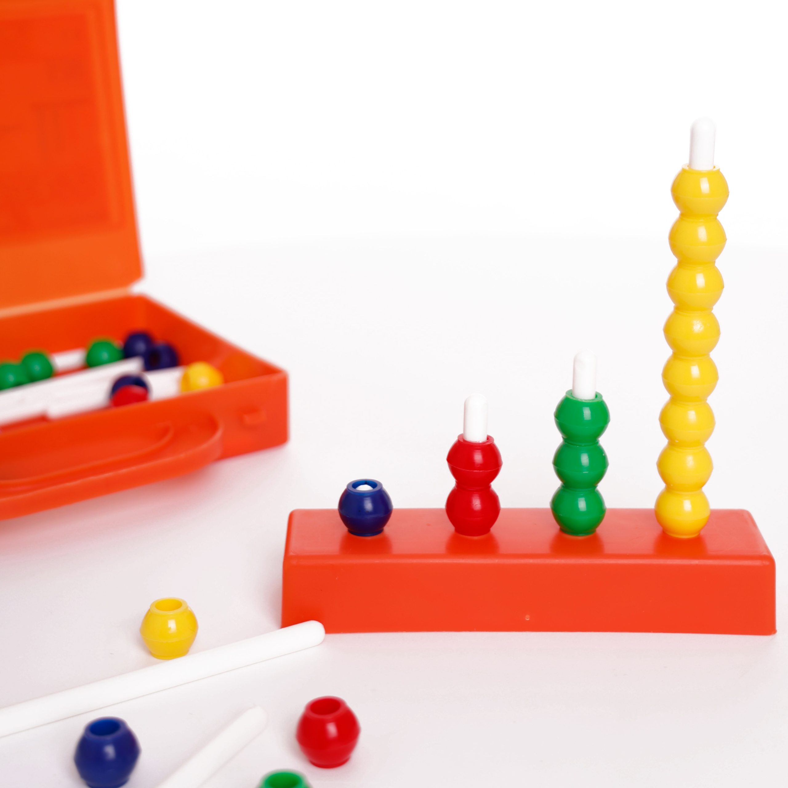 Teaching kit with cuisenaire rods, multibase abacus, logical figures, and educational manual. - Image 3
