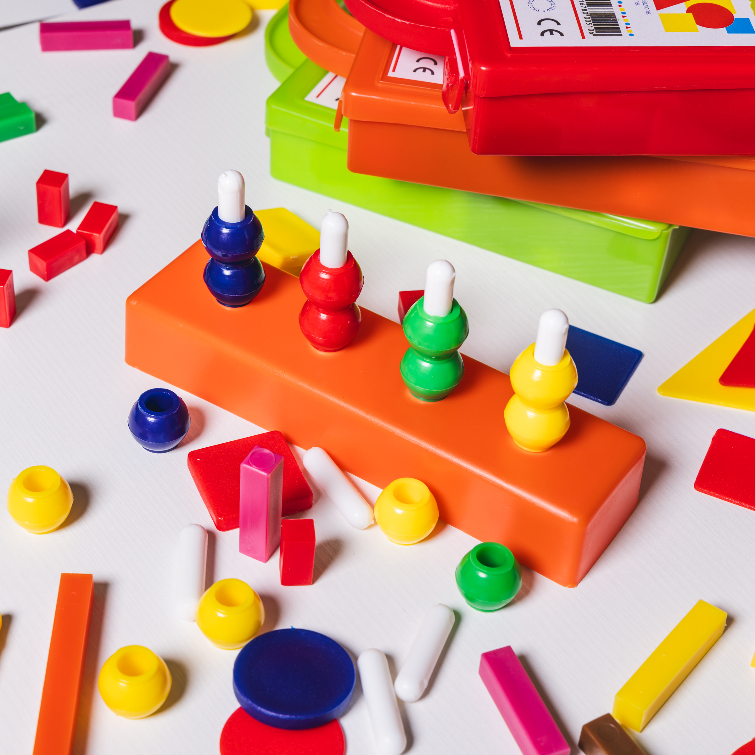 Teaching kit with cuisenaire rods, multibase abacus, logical figures, and educational manual. - Image 8